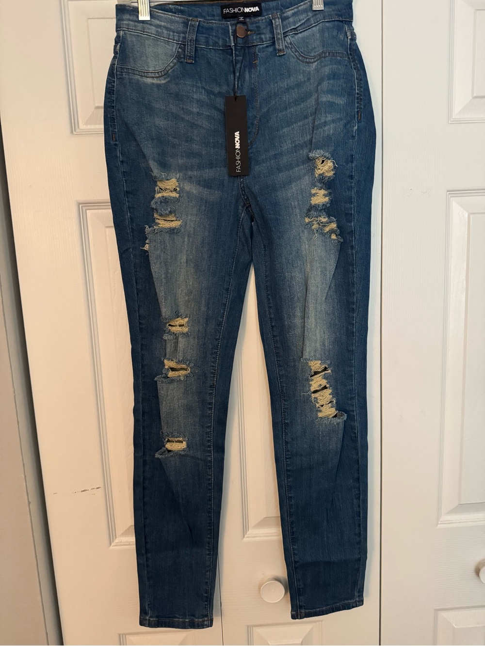 Fashion Nova Medium Blue Ripped Skinny Jeans